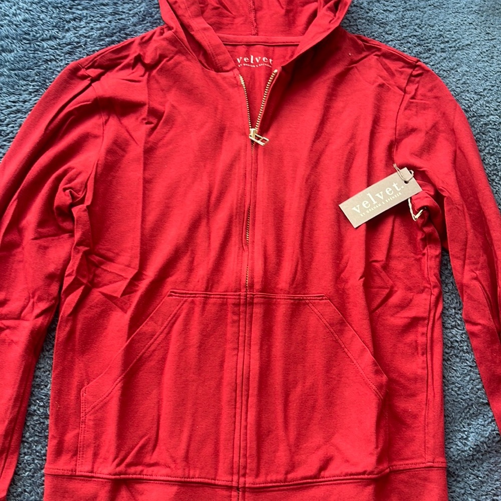 Sweater easy for on the go it’s 94% cotton 6% Lycra